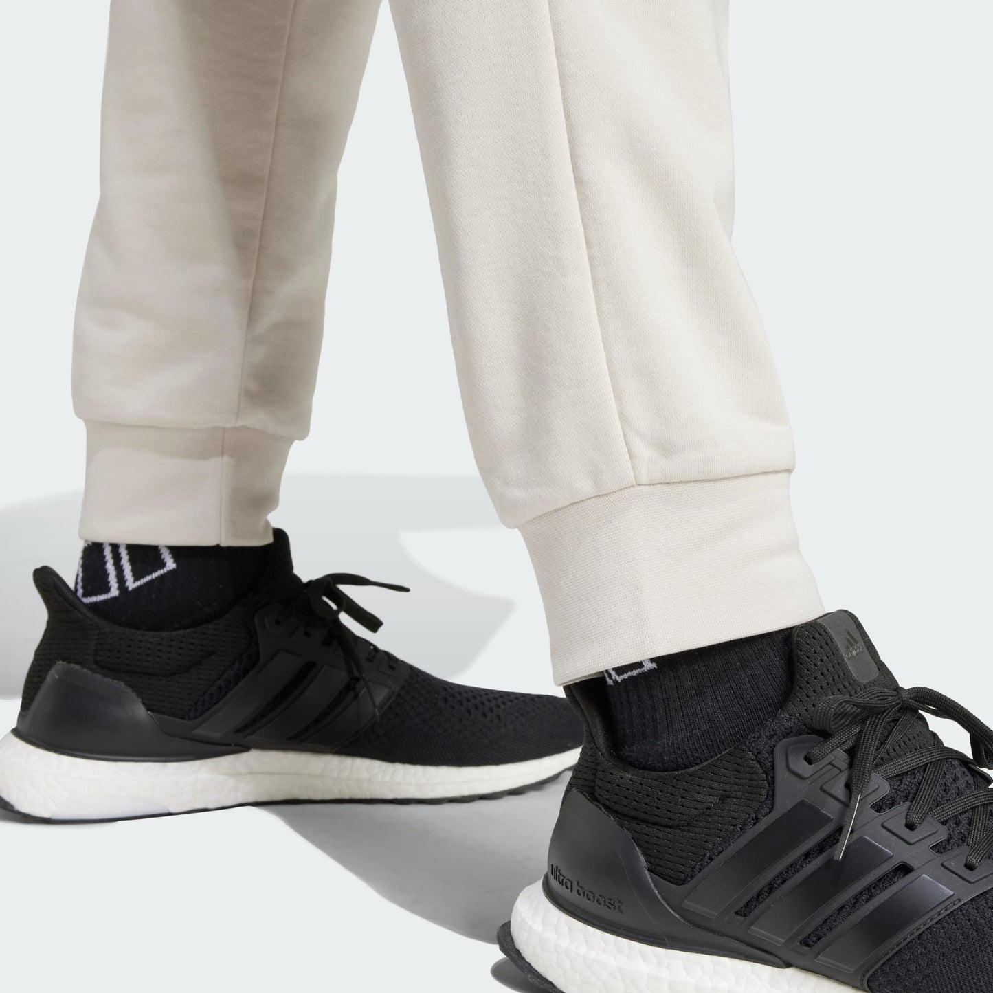PANTALONI ADIDAS ESSENTIALS FEEL COMFORT FRENCH TERRY BEIGE UOMO